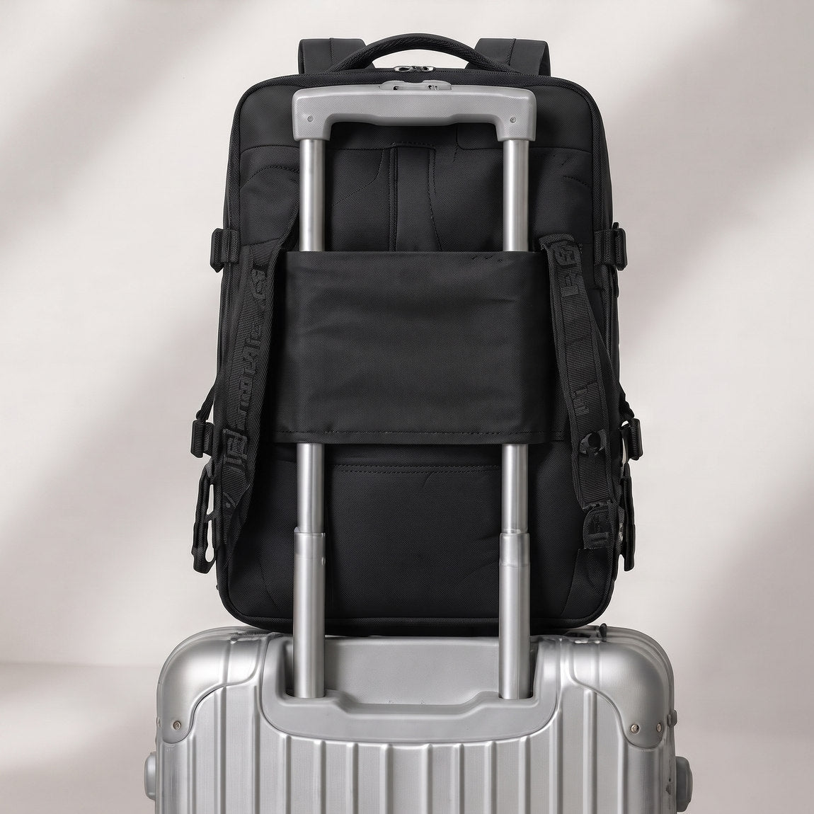 Backpack on a suitcase handle