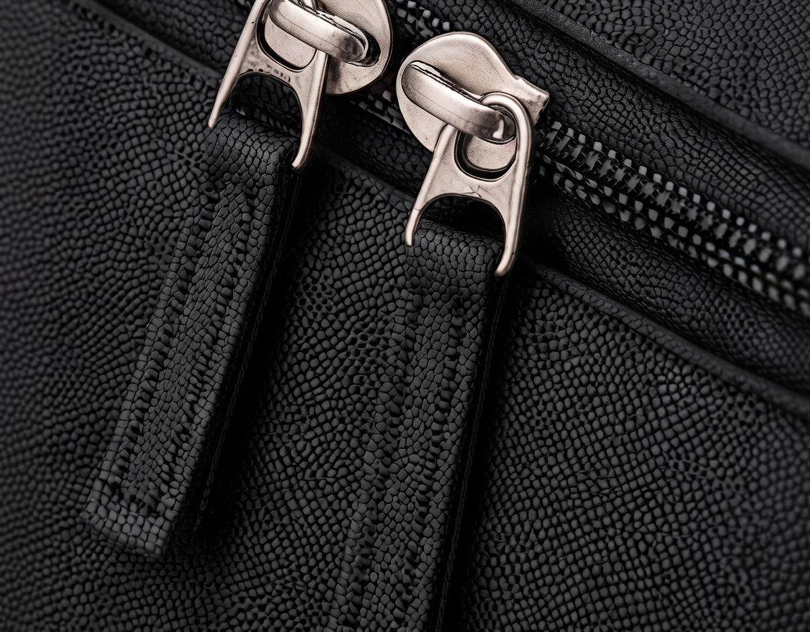 Twin metal zip pulls